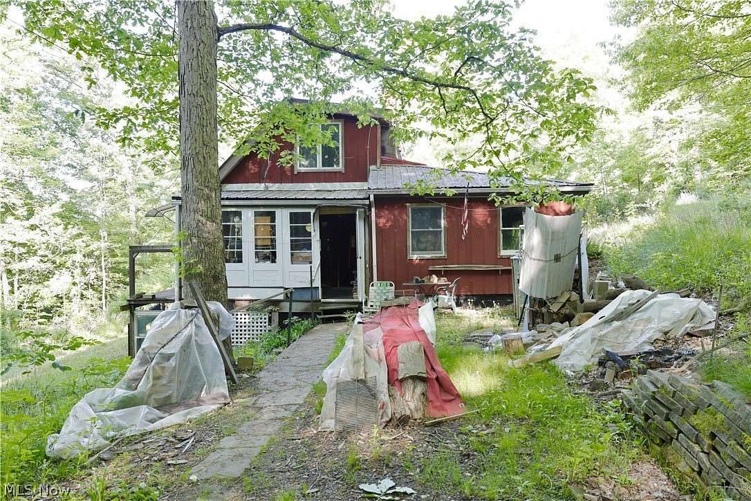 6.12 Acres of Land with Home for Auction in Big Prairie, Ohio
