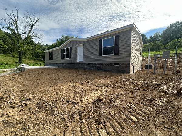 5.62 Acres of Land with Home for Sale in Woodbury, Tennessee