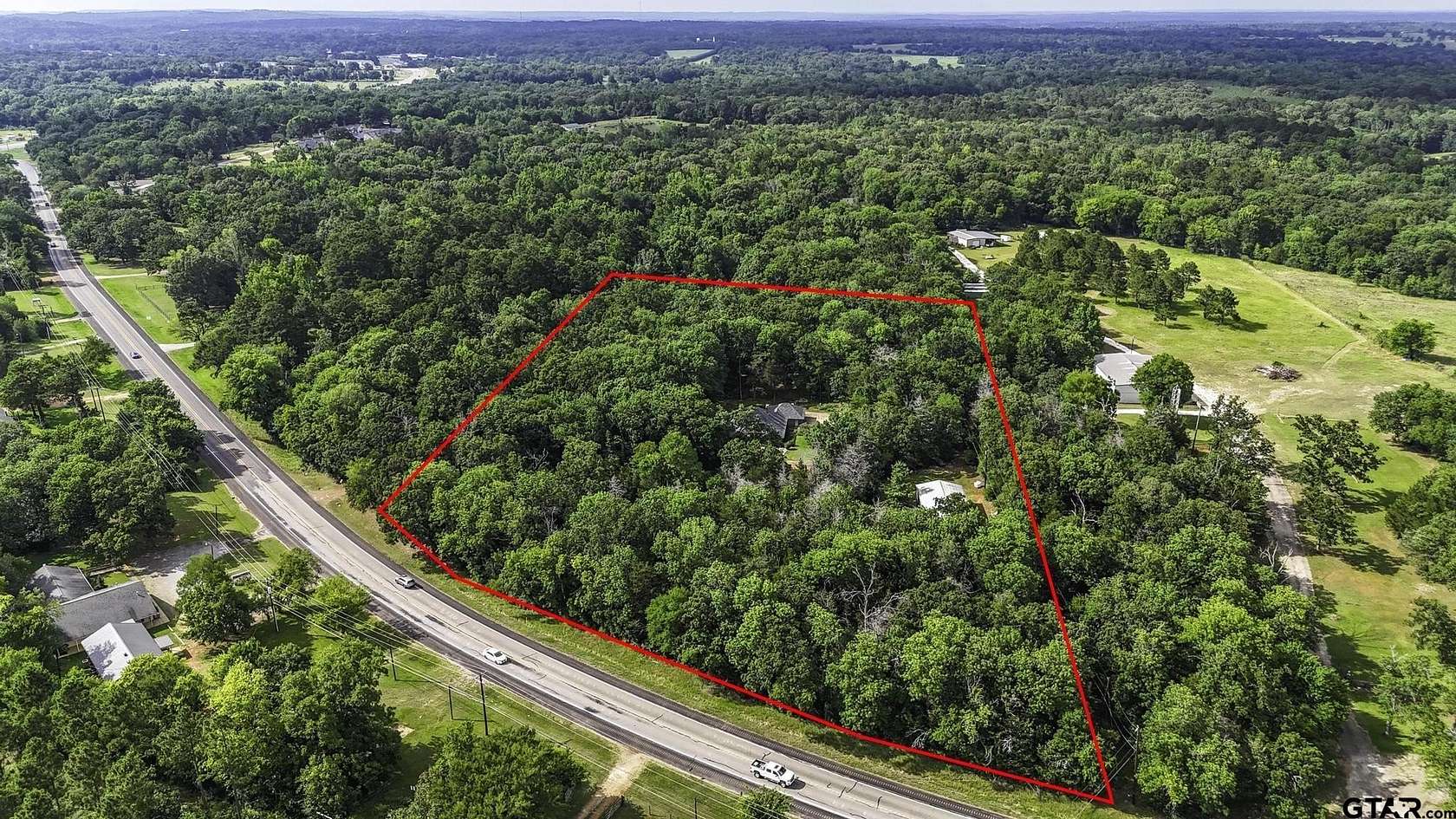 6.84 Acres of Land with Home for Sale in Palestine, Texas