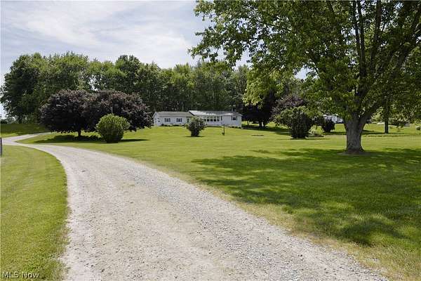 10 Acres of Land with Home for Auction in Warsaw, Ohio