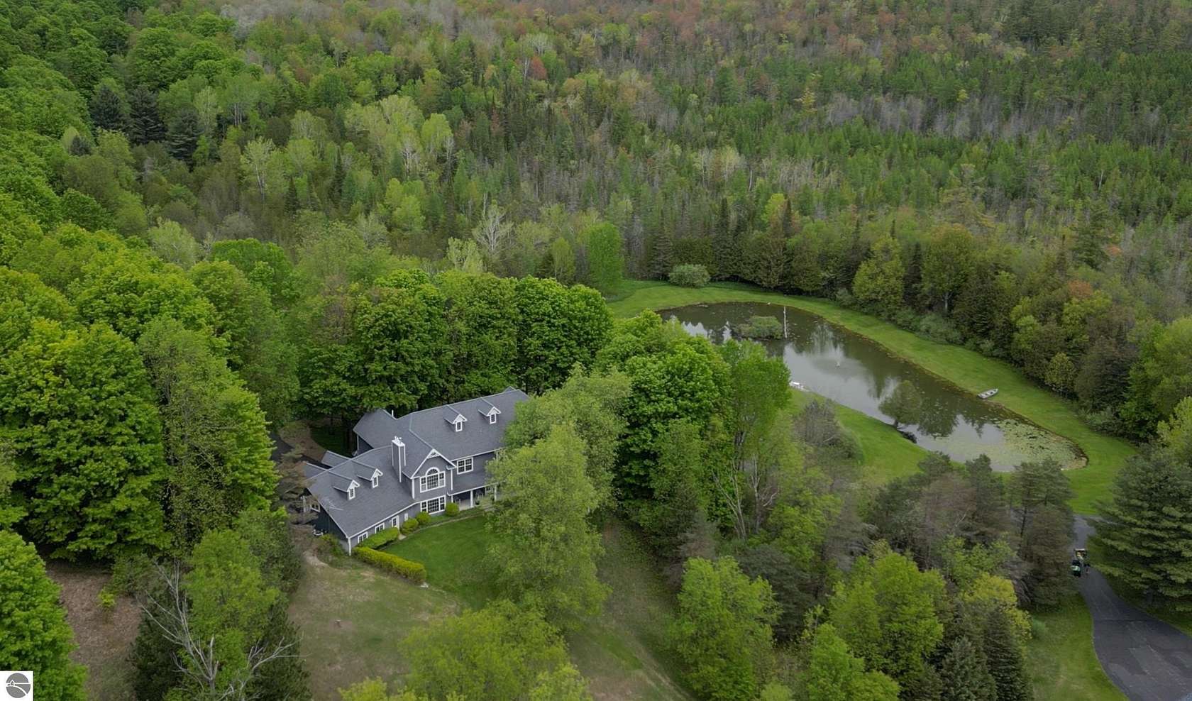 401 Acres of Land with Home for Sale in Cedar, Michigan