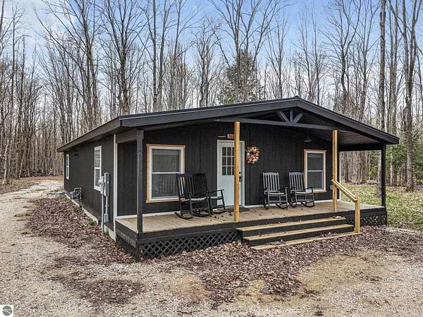 2.43 Acres of Land with Home for Sale in Mancelona, Michigan