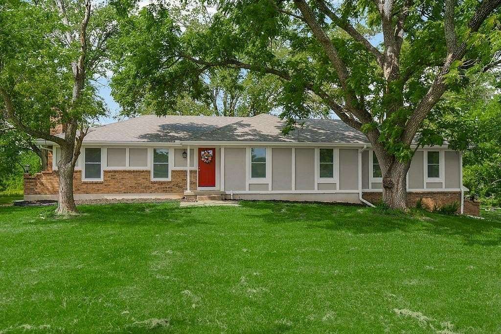 4.7 Acres of Land with Home for Sale in Peculiar, Missouri