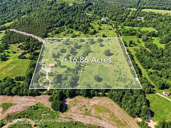 16.9 Acres of Land with Home for Sale in Eureka Springs, Arkansas