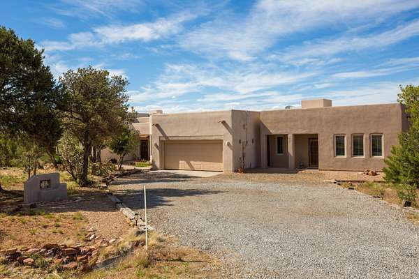 2 Acres of Land with Home for Sale in Sandia Park, New Mexico