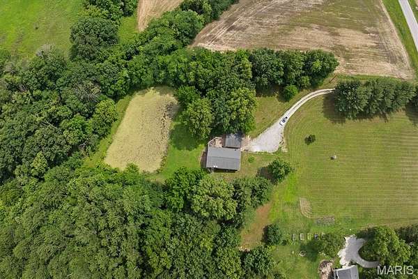 14.2 Acres of Land with Home for Sale in Worden, Illinois