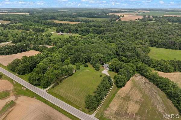 14.2 Acres of Land with Home for Sale in Worden, Illinois