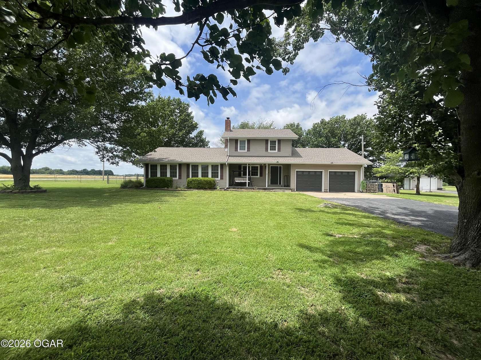 2.5 Acres of Land with Home for Sale in Carl Junction, Missouri