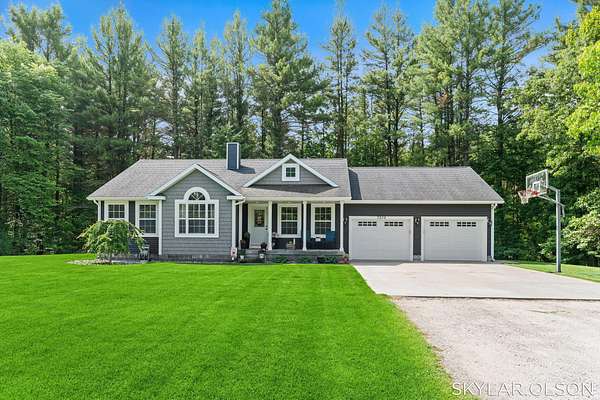 4.86 Acres of Land with Home for Sale in Twin Lake, Michigan