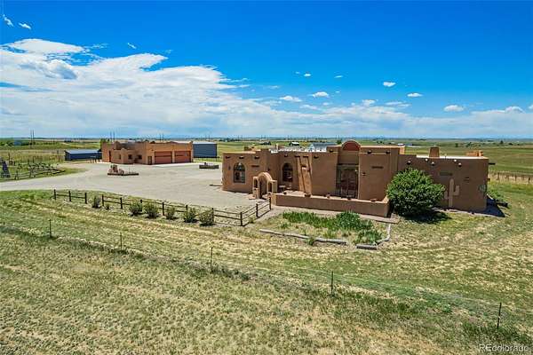 40.1 Acres of Agricultural Land with Home for Sale in Strasburg, Colorado