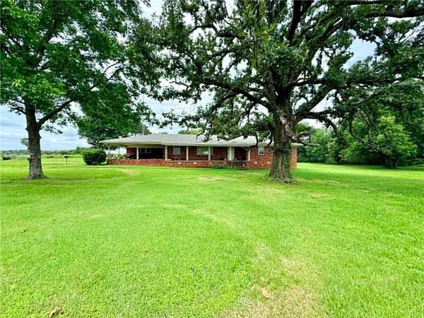 4.85 Acres of Land with Home for Sale in Dardanelle, Arkansas