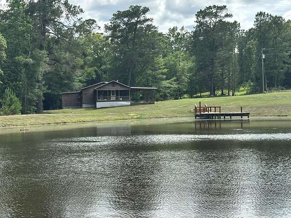143 Acres of Recreational Land with Home for Sale in Florala, Alabama