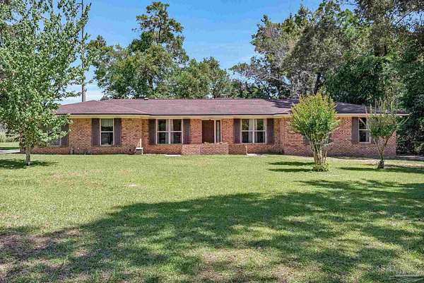 2.4 Acres of Land with Home for Sale in Pace, Florida
