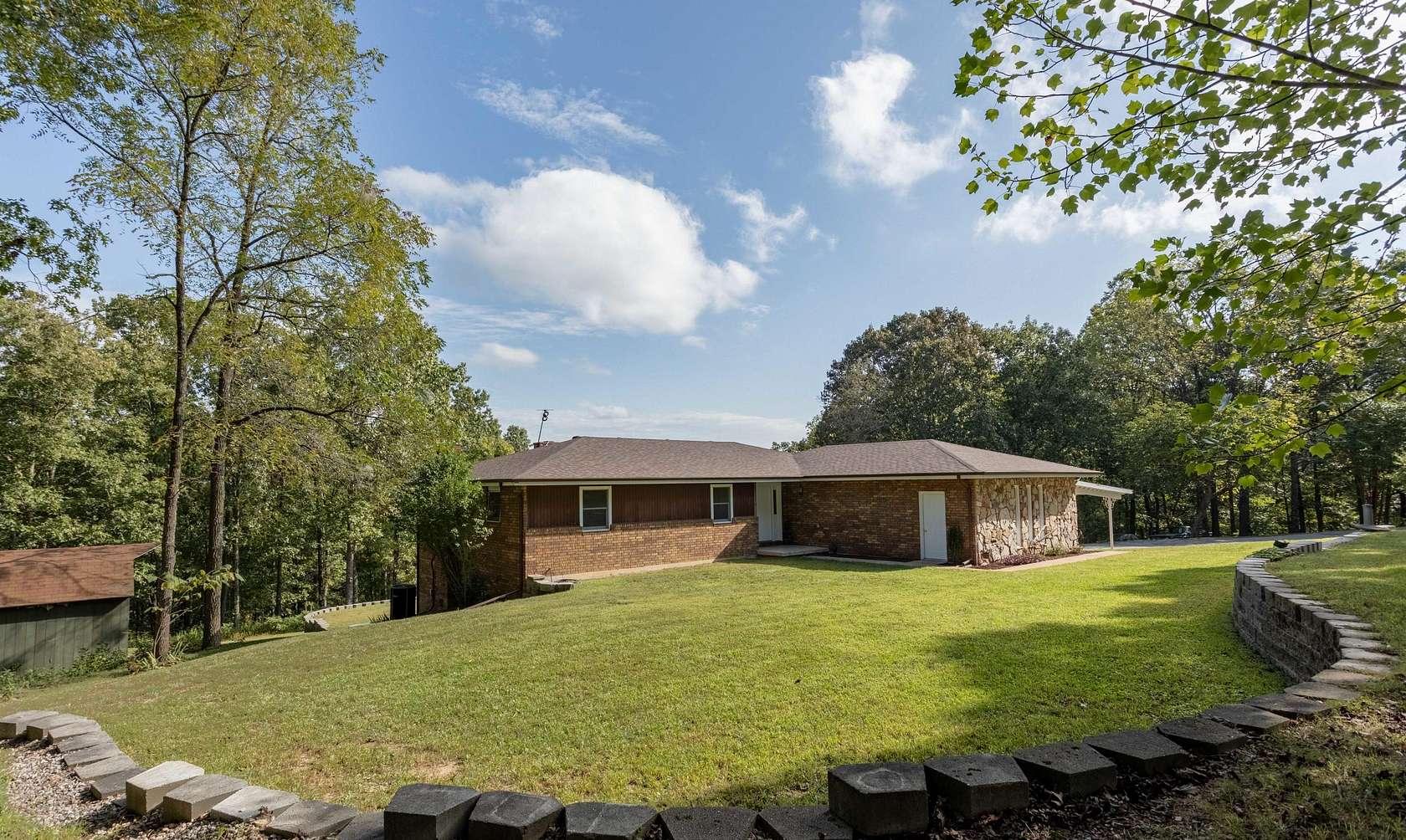 31.2 Acres of Recreational Land with Home for Sale in Walnut Shade, Missouri