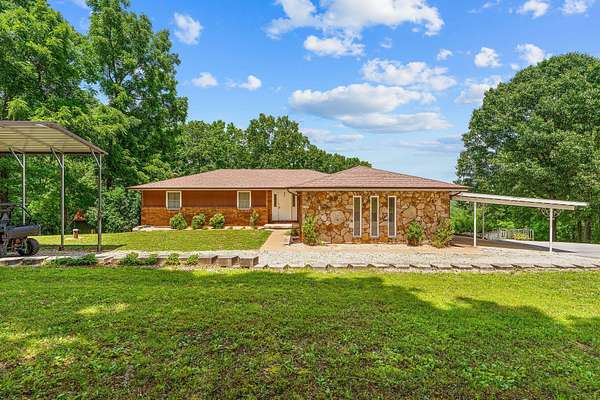 31.2 Acres of Recreational Land with Home for Sale in Walnut Shade, Missouri