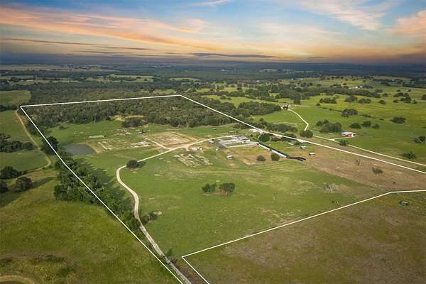 71 Acres of Recreational Land with Home for Sale in Cameron, Texas