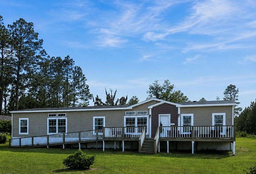 1.69 Acres of Land with Home for Sale in Du Pont, Georgia