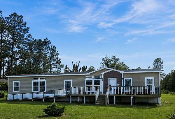 1.69 Acres of Land with Home for Sale in Du Pont, Georgia