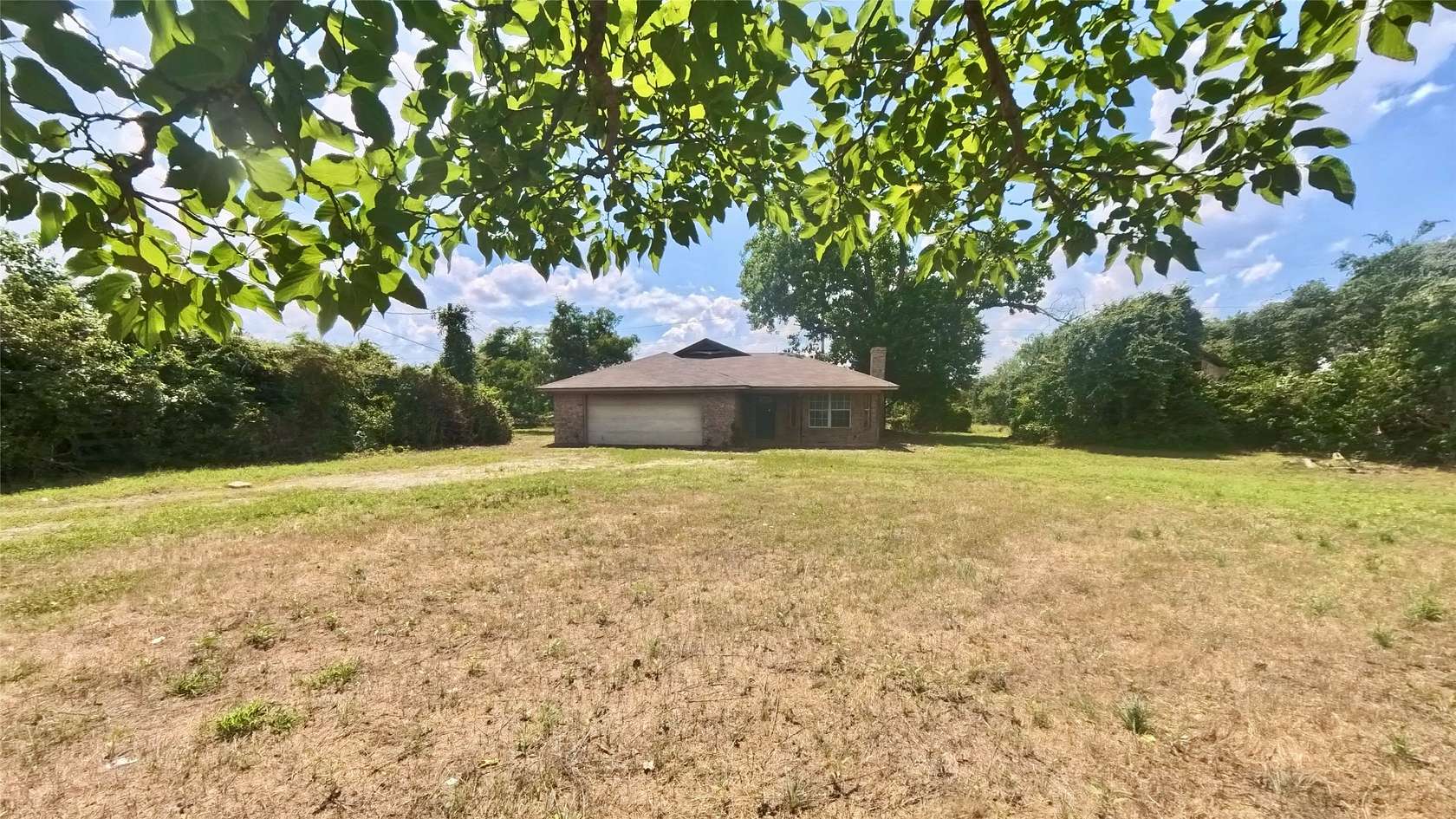 10 Acres of Land with Home for Sale in Springtown, Texas