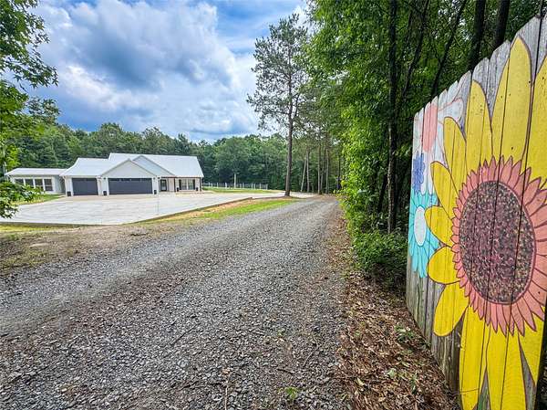 20.7 Acres of Recreational Land with Home for Sale in Atlanta, Texas