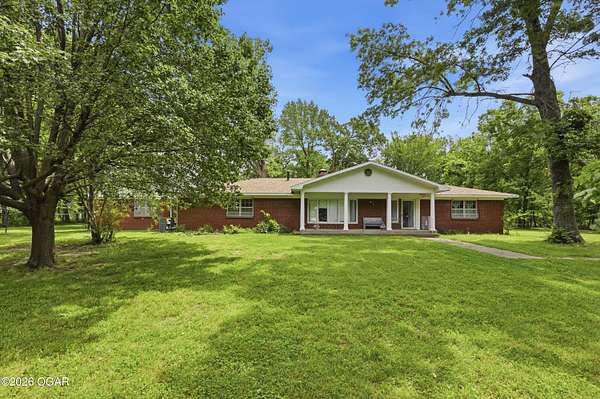 1.5 Acres of Land with Home for Sale in Joplin, Missouri