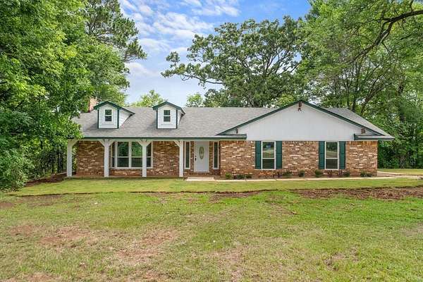 9.66 Acres of Land with Home for Sale in Palestine, Texas