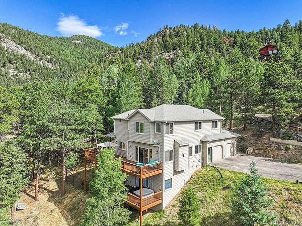 1.69 Acres of Land with Home for Sale in Evergreen, Colorado