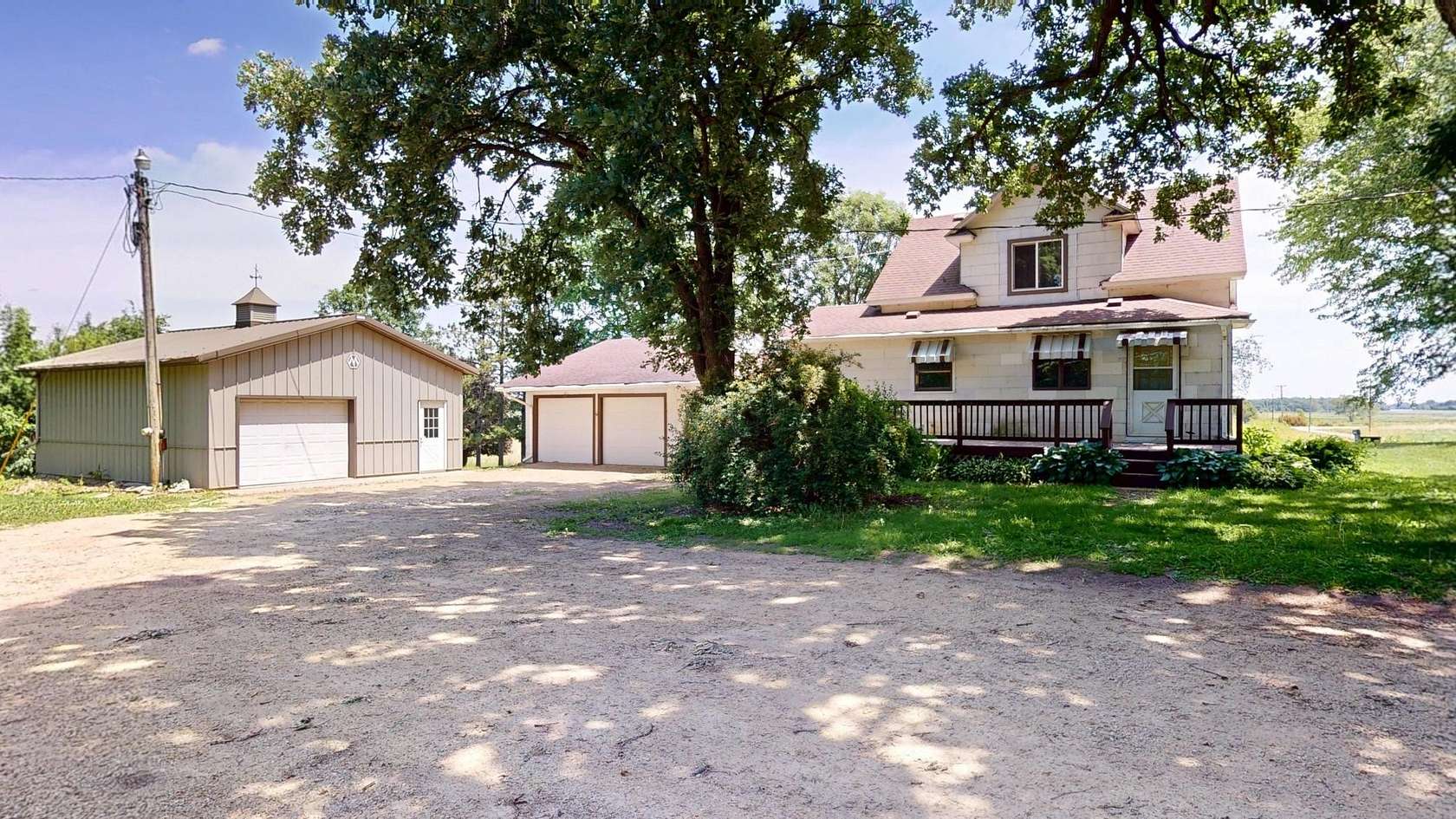 5 Acres of Land with Home for Sale in Clarks Grove, Minnesota