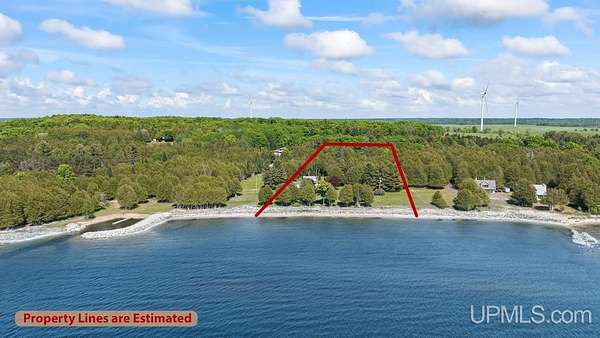 7 Acres of Land with Home for Sale in Garden, Michigan