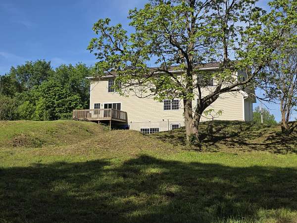 9.25 Acres of Land with Home for Sale in Eau Claire, Michigan