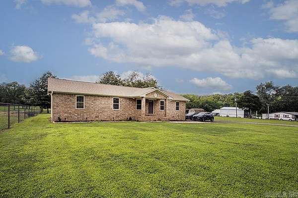 5 Acres of Land with Home for Sale in Jacksonville, Arkansas