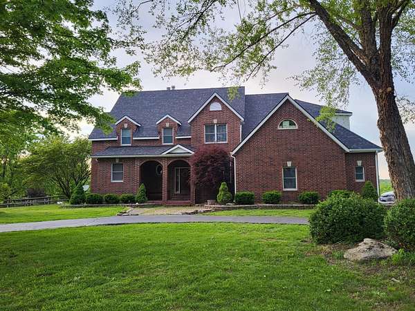 10 Acres of Land with Home for Sale in Rogersville, Missouri