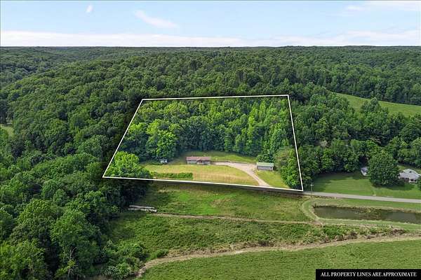3.56 Acres of Land with Home for Sale in McEwen, Tennessee