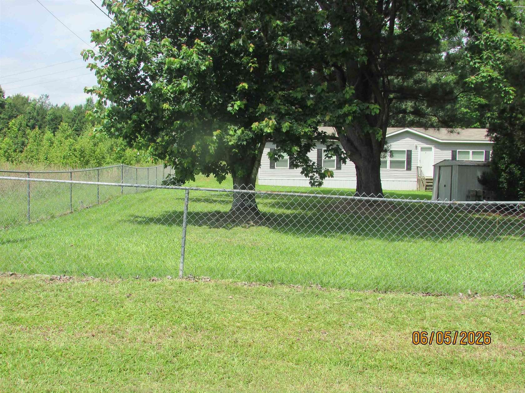 5 Acres of Land with Home for Sale in Jacksonville, Arkansas