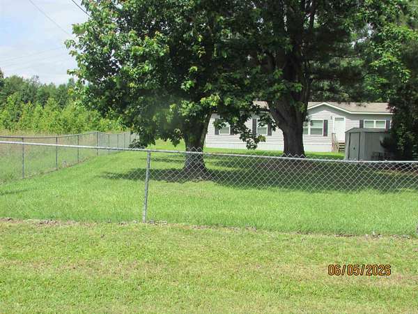 5 Acres of Land with Home for Sale in Jacksonville, Arkansas