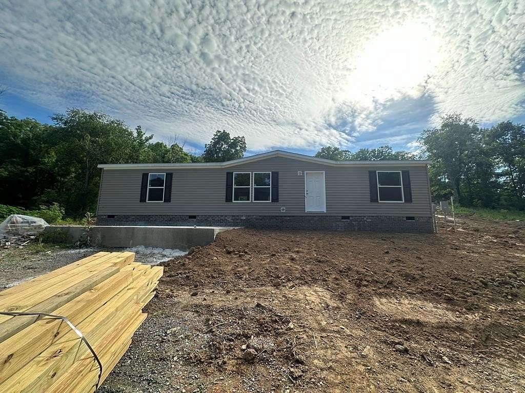 5.68 Acres of Land with Home for Sale in Woodbury, Tennessee
