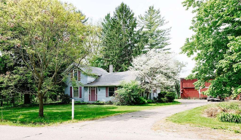 3.2 Acres of Land with Home for Sale in Caledonia, Michigan
