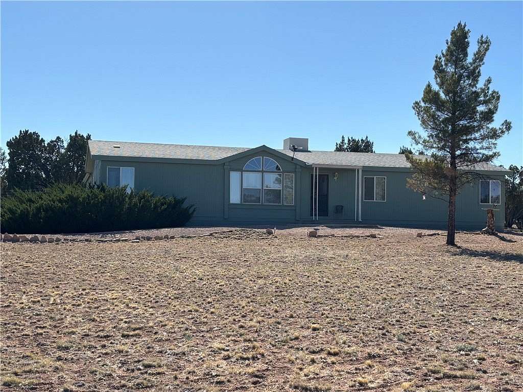 1.67 Acres of Land with Home for Sale in Seligman, Arizona