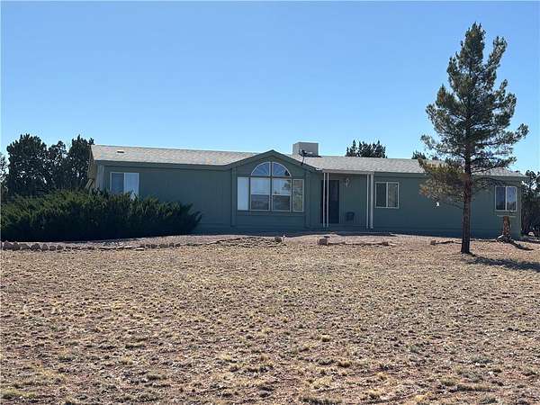 1.67 Acres of Land with Home for Sale in Seligman, Arizona