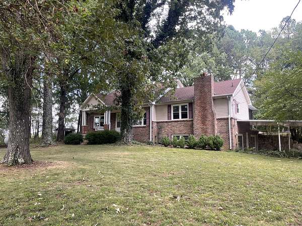 6.55 Acres of Land with Home for Sale in Summertown, Tennessee