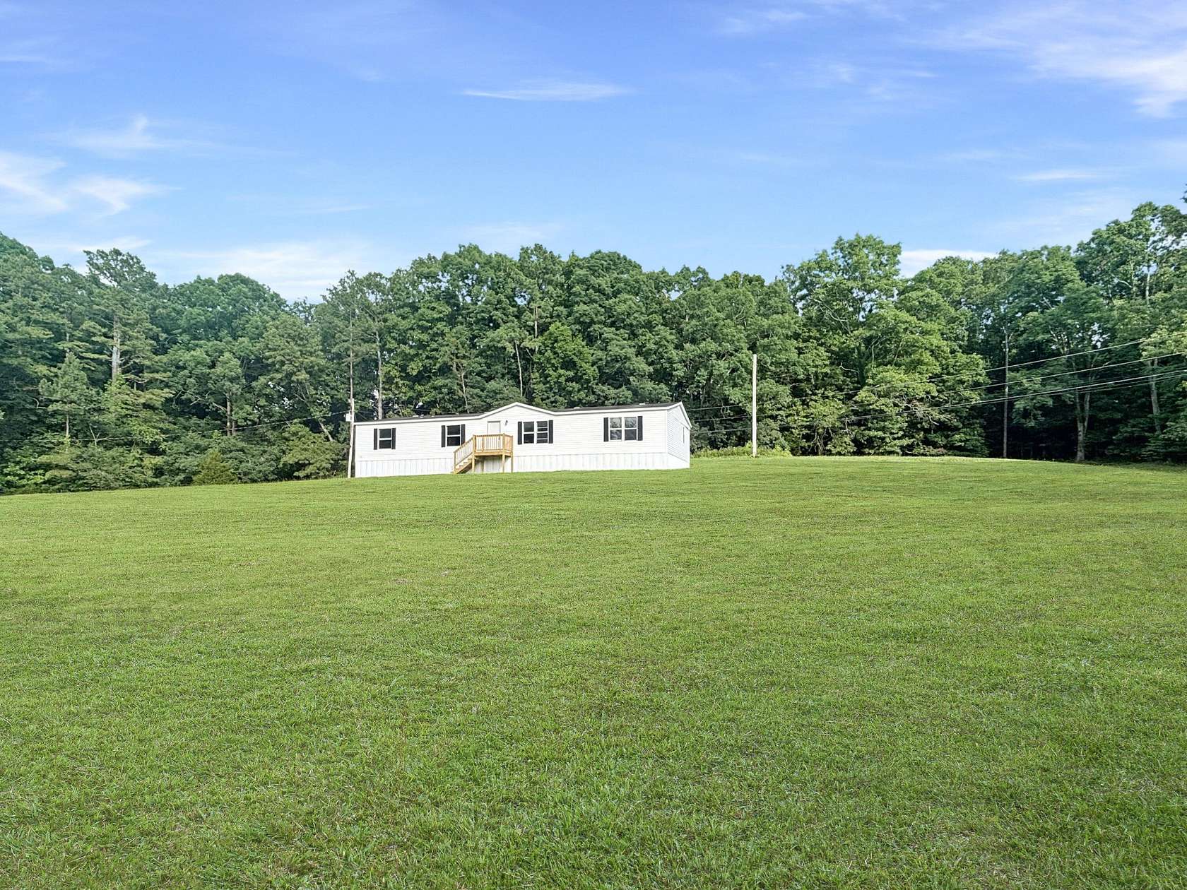 3 Acres of Land with Home for Sale in Cleveland, Tennessee