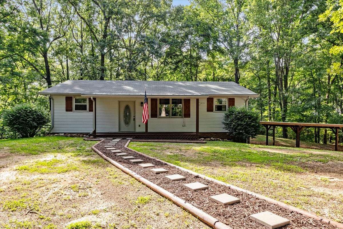5 Acres of Land with Home for Sale in Bon Aqua, Tennessee
