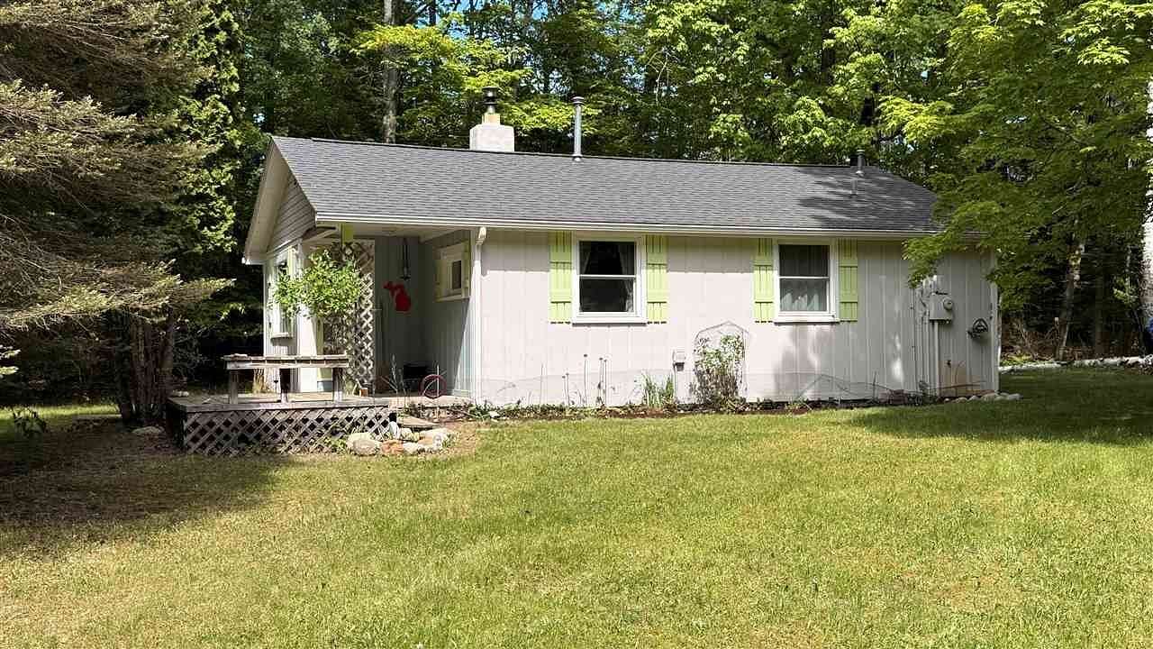 3.28 Acres of Land with Home for Sale in Kewadin, Michigan