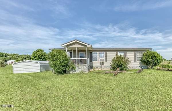 6.88 Acres of Land with Home for Sale in Chuckey, Tennessee