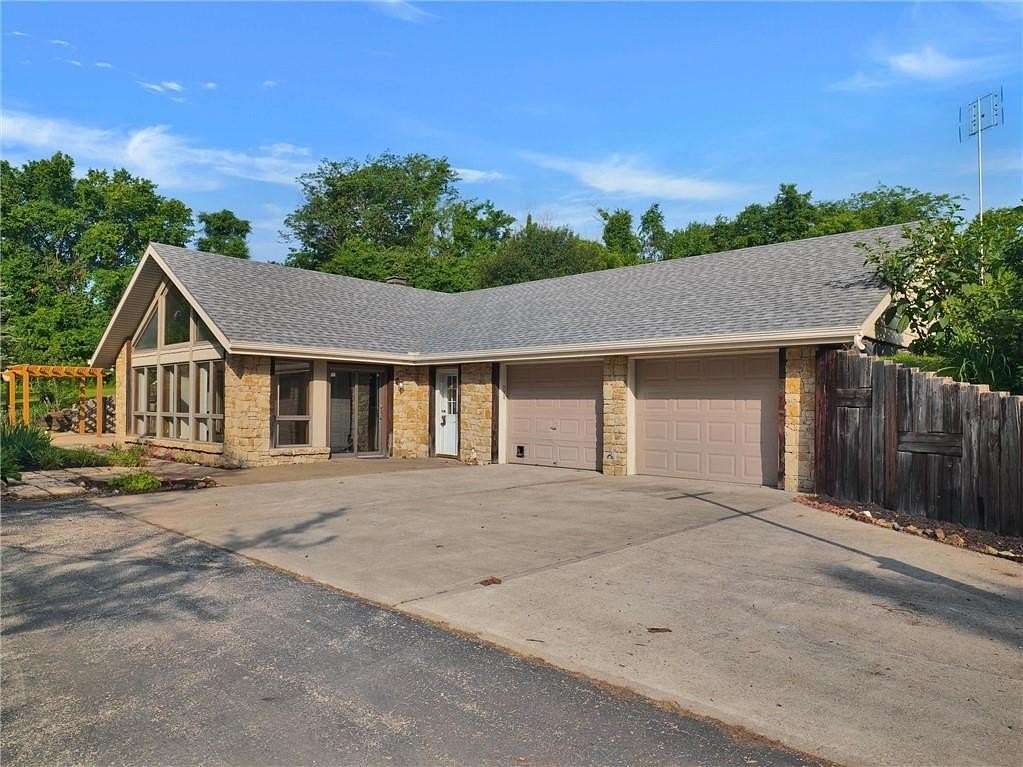 13.3 Acres of Land with Home for Sale in Oak Grove, Missouri