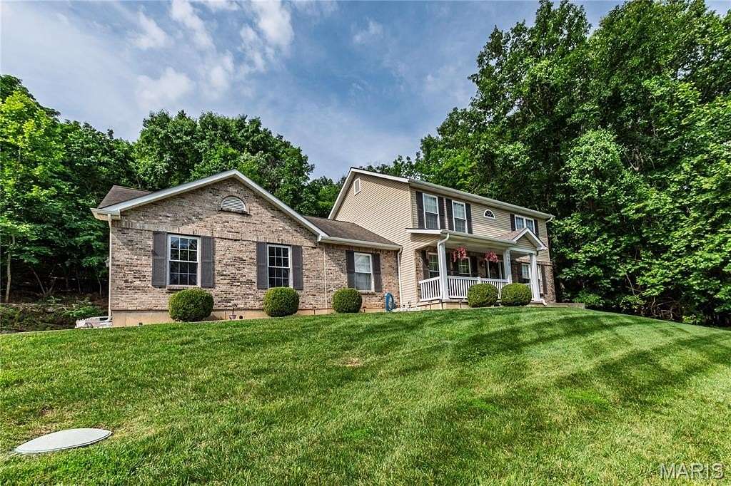1.55 Acres of Land with Home for Sale in Byrnes Mill, Missouri