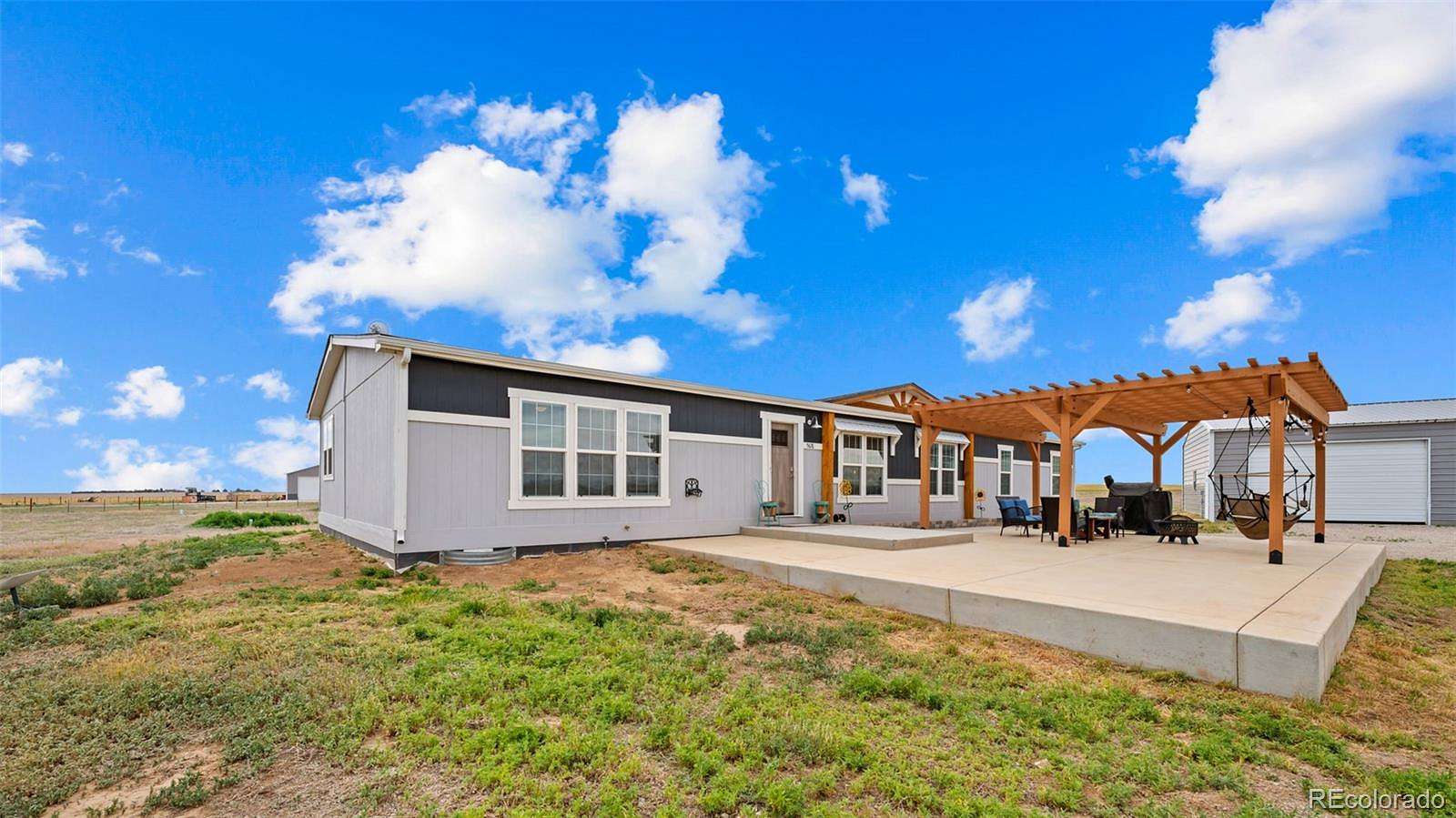 10 Acres of Land with Home for Sale in Roggen, Colorado