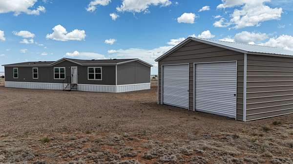 2.5 Acres of Land with Home for Sale in Moriarty, New Mexico