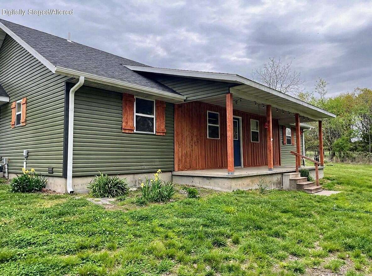 3.1 Acres of Land with Home for Sale in Hartville, Missouri