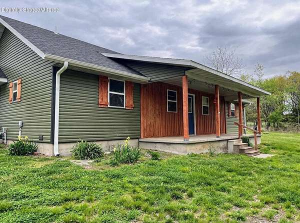 3.1 Acres of Land with Home for Sale in Hartville, Missouri